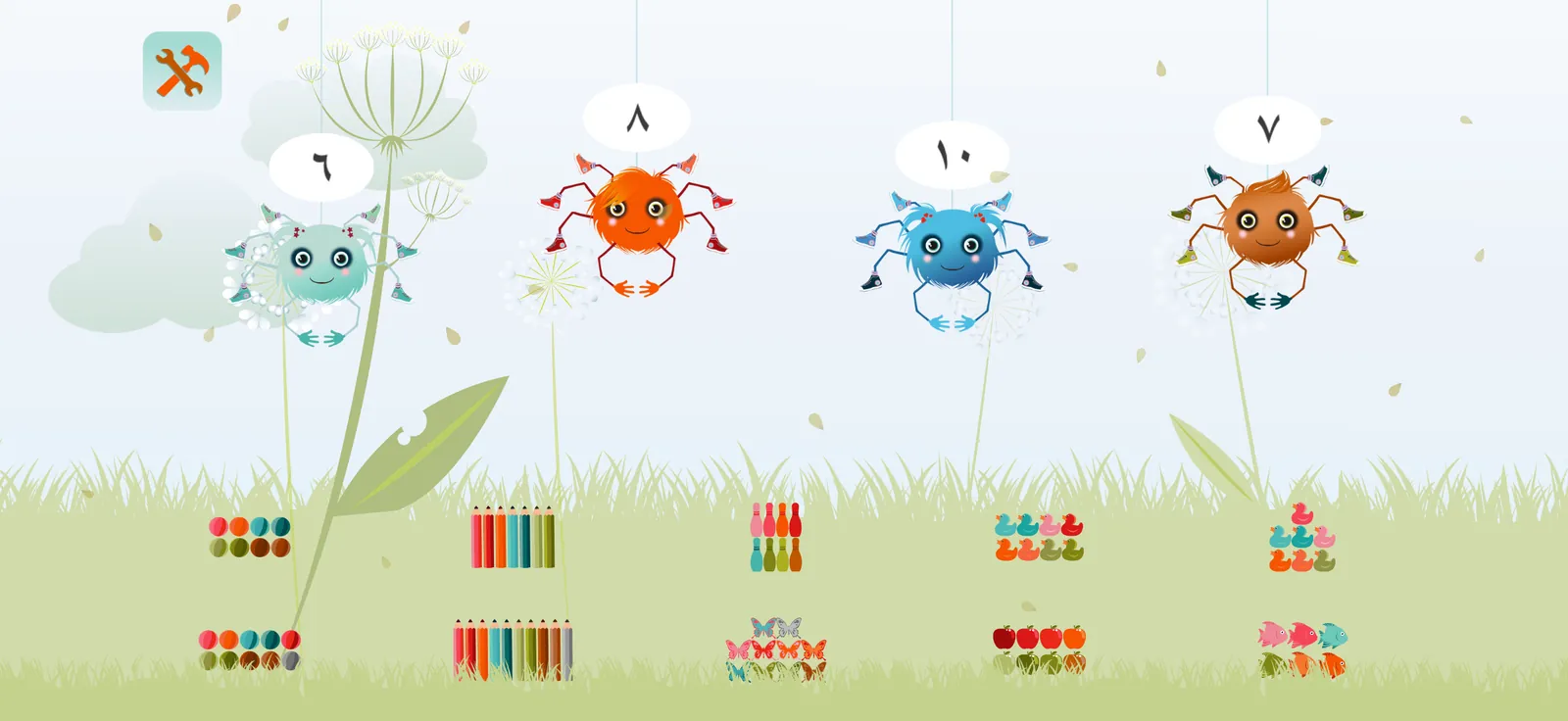The numbers game on iPhone: four spiders each showing a number, with groups of objects in the grass